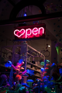 A vibrant display of colorful promotional banners hanging in a cozy shop window.