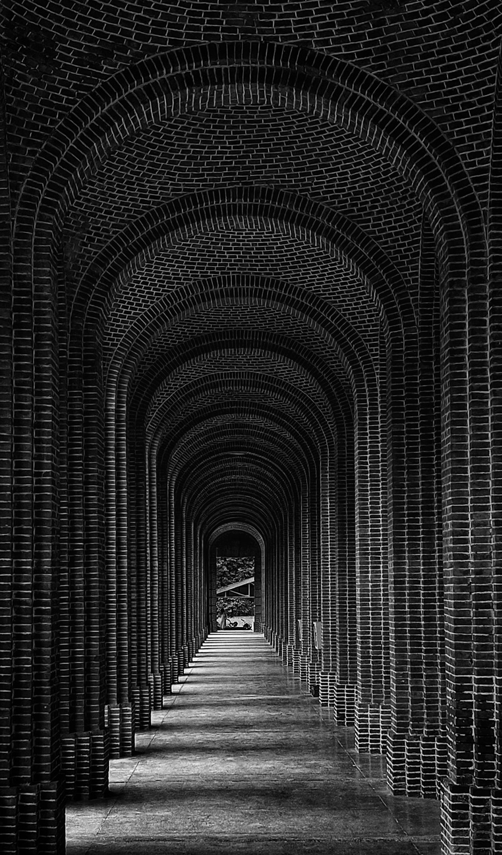 a dark stone hallway