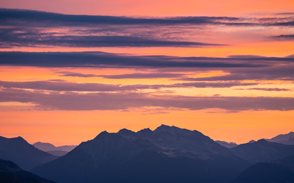 a mountain range with a sunset