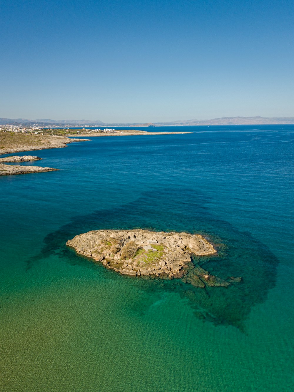 an island in the middle of a body of water