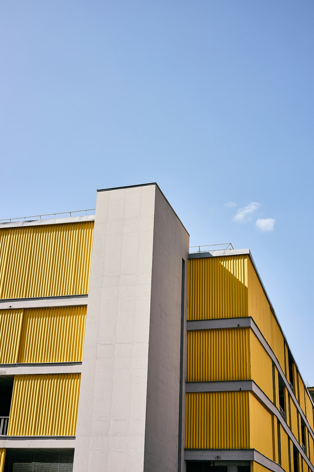 a building with yellow and black windows