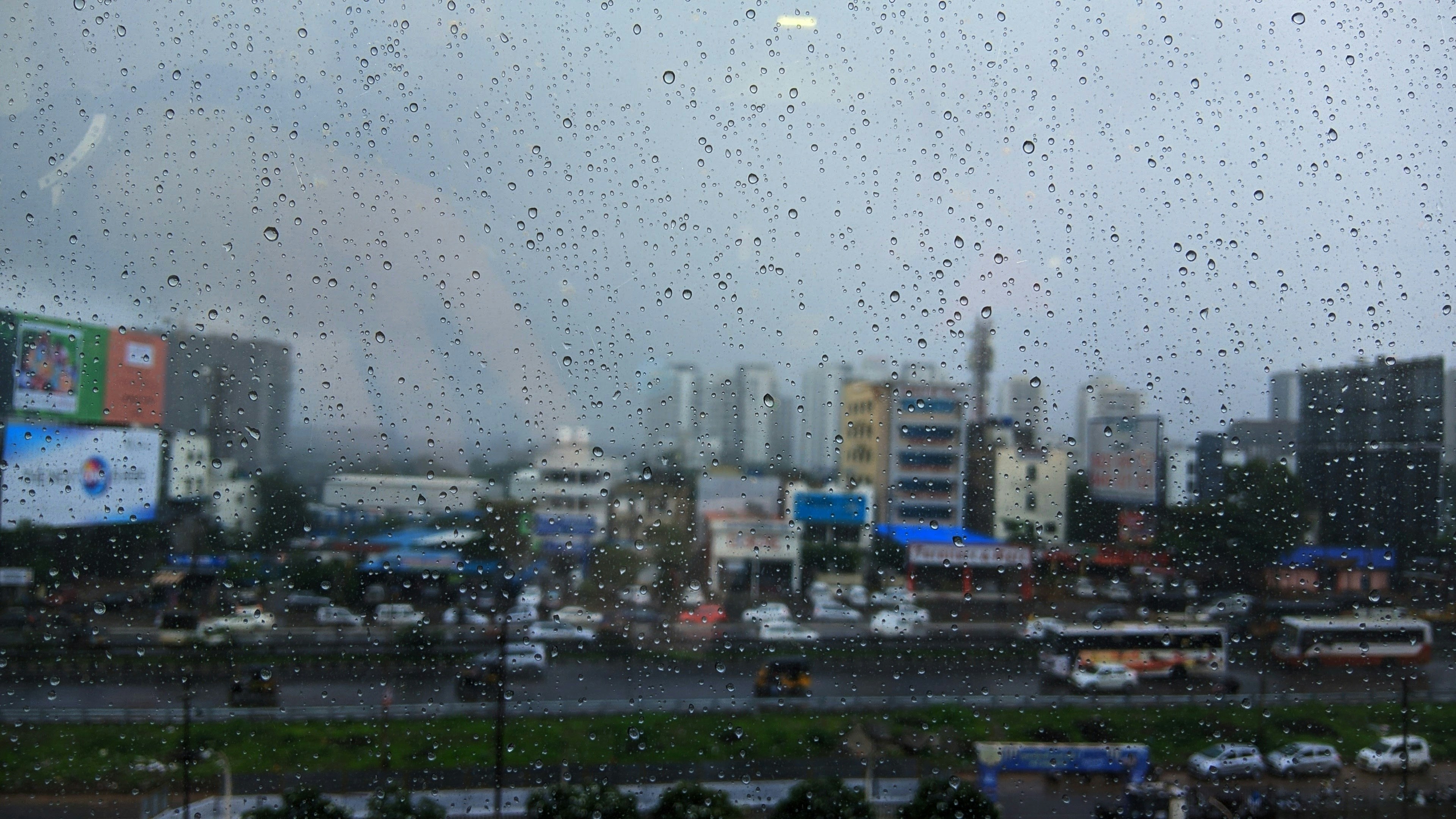 a city with cars and buildings