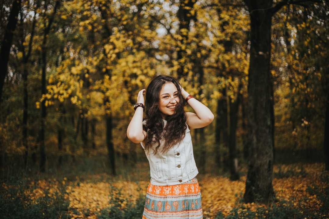 a person standing in a forest,