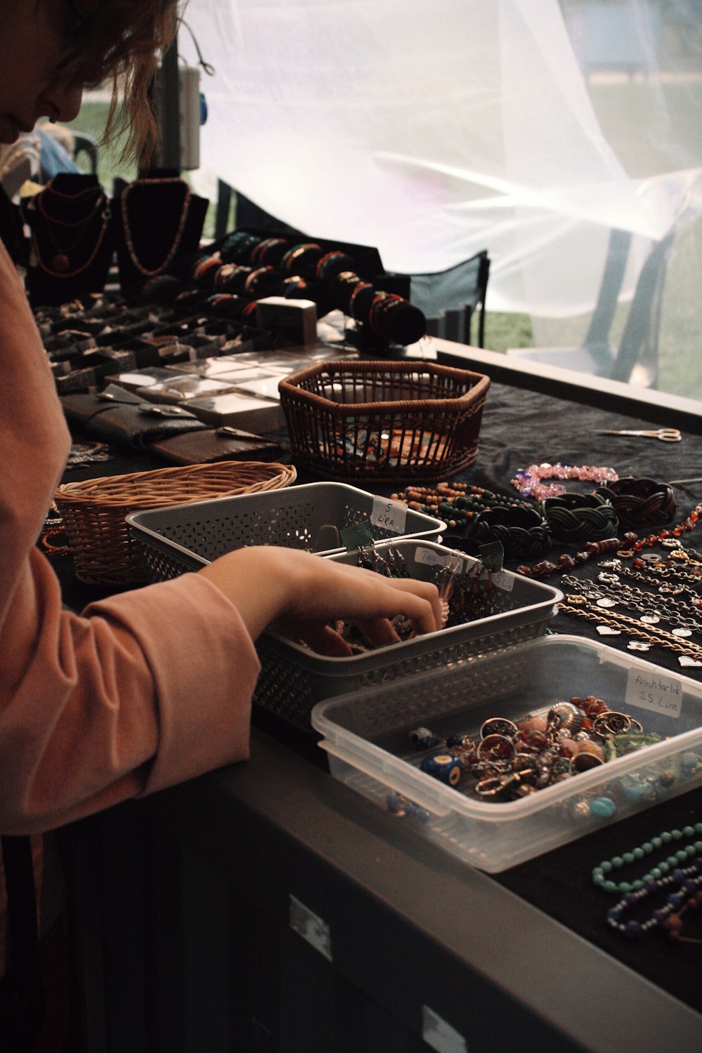 a person holding a tray of food