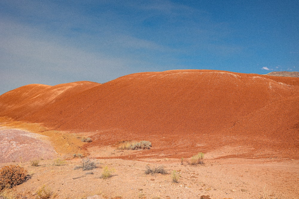 a desert landscape with sand dunes