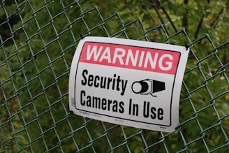a sign on a fence