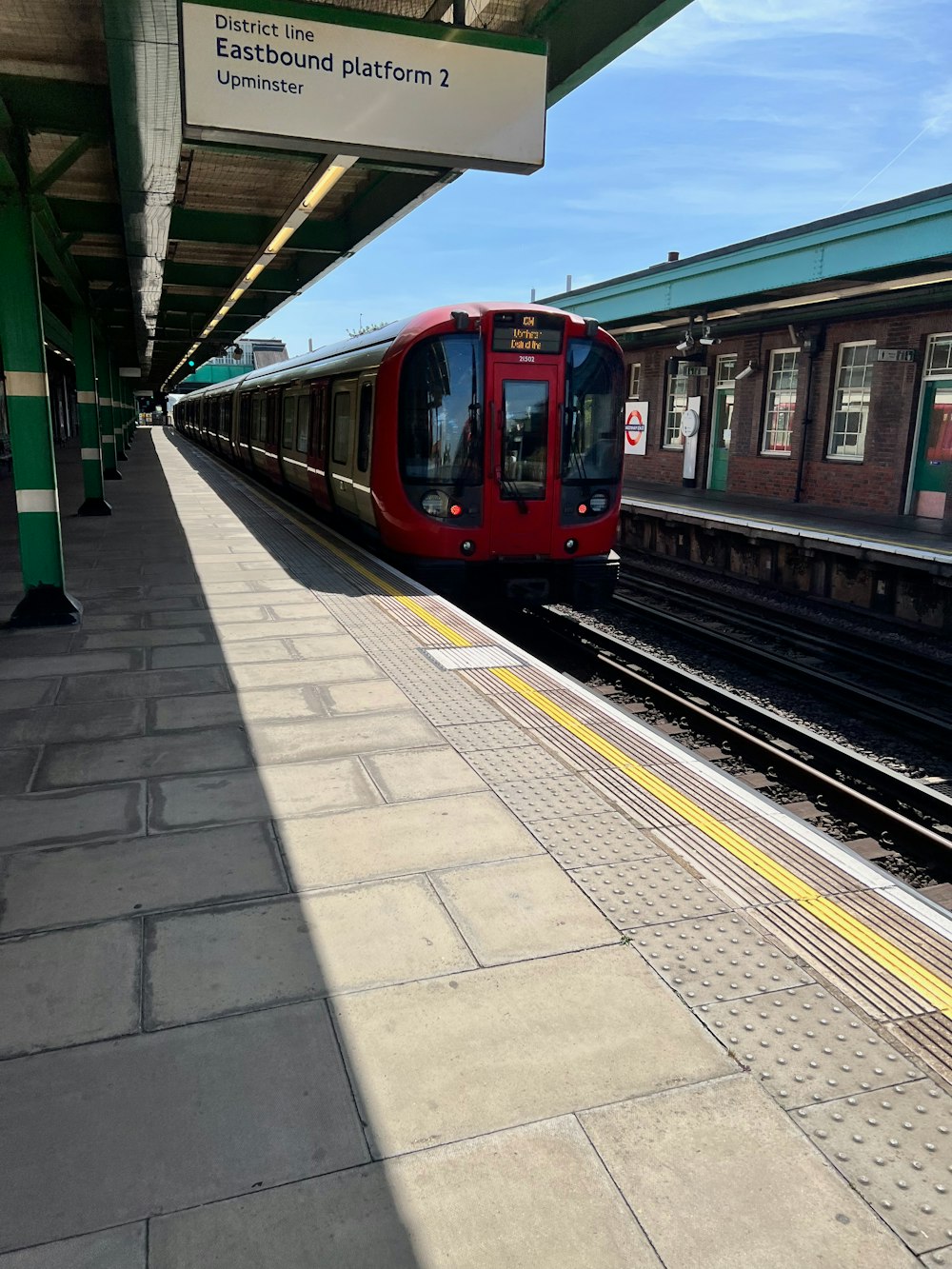 a red train at a train station