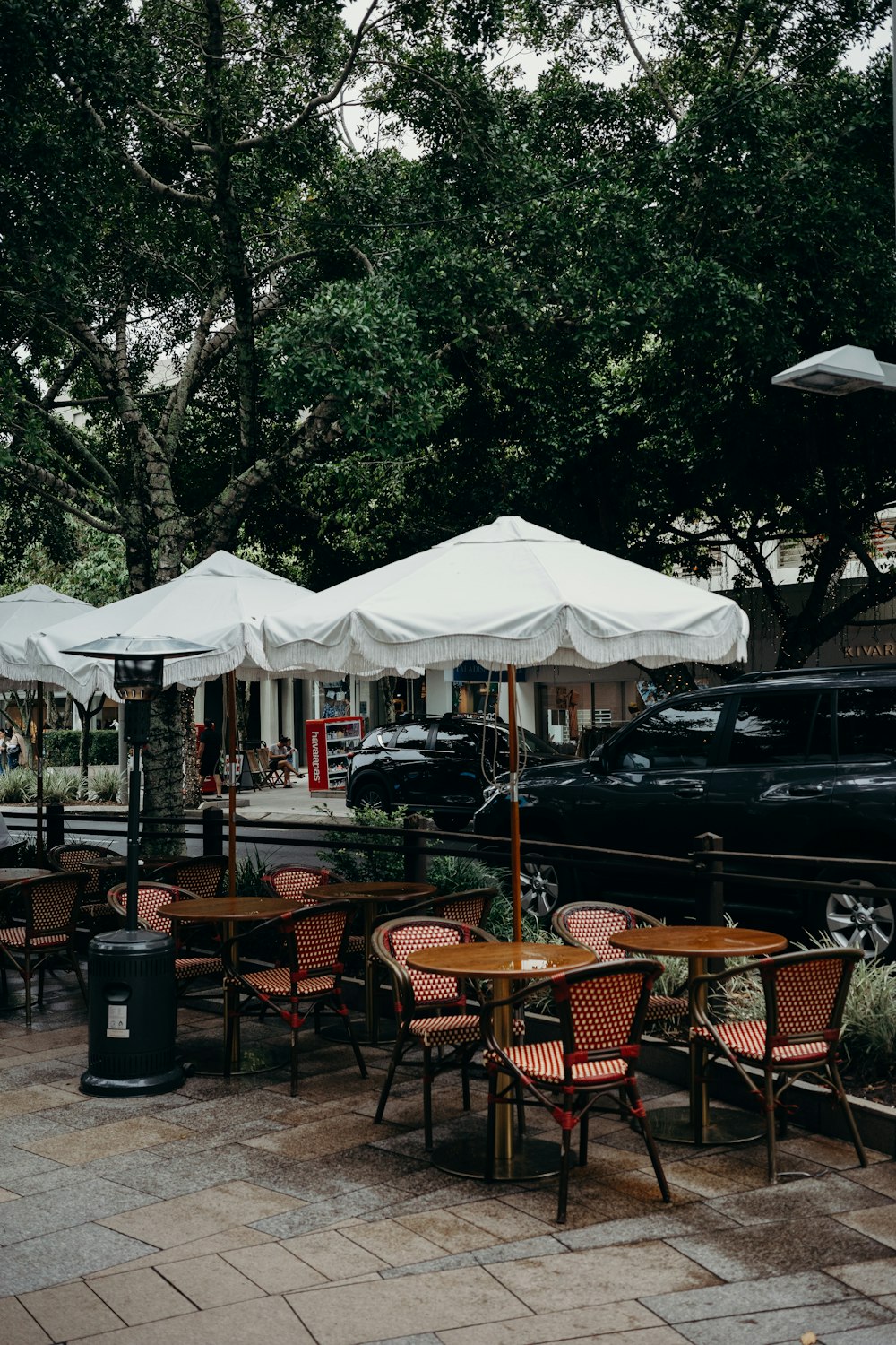 a group of tables and chairs outside