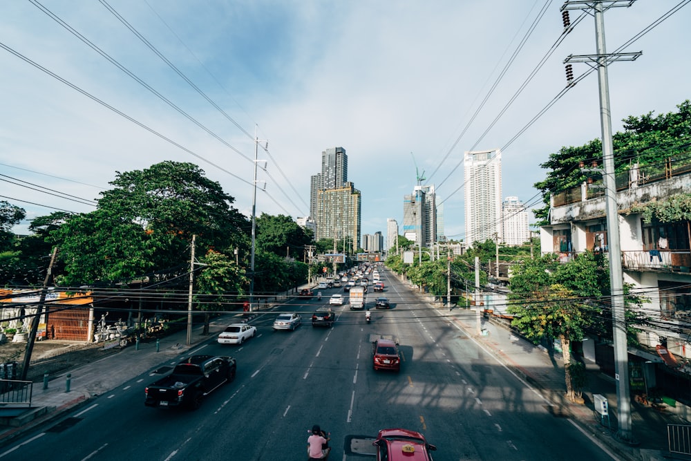 a street with cars and buildings on the side