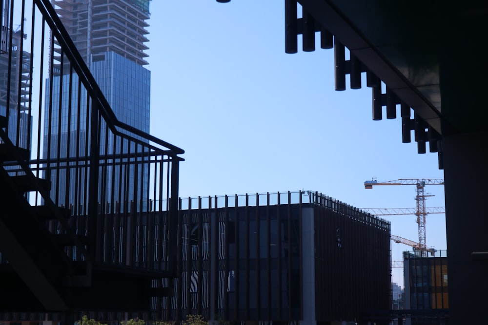 a construction site with cranes