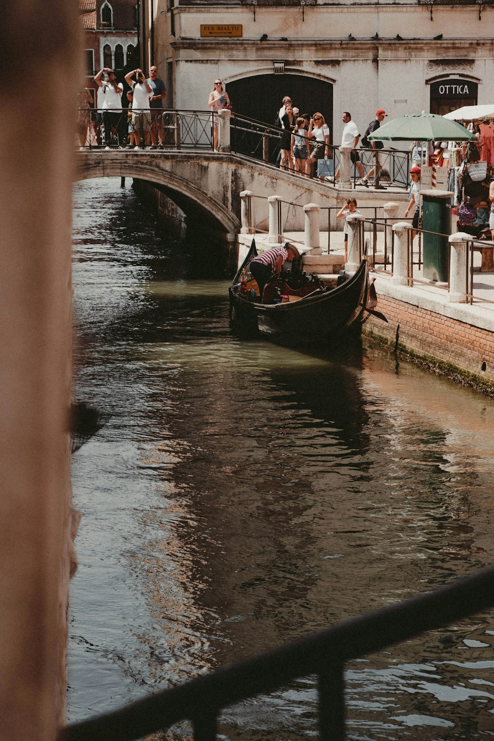 a boat travels down a canal