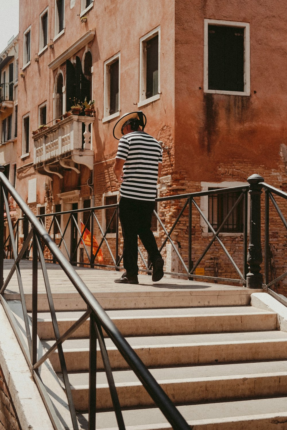 a man standing on a set of stairs