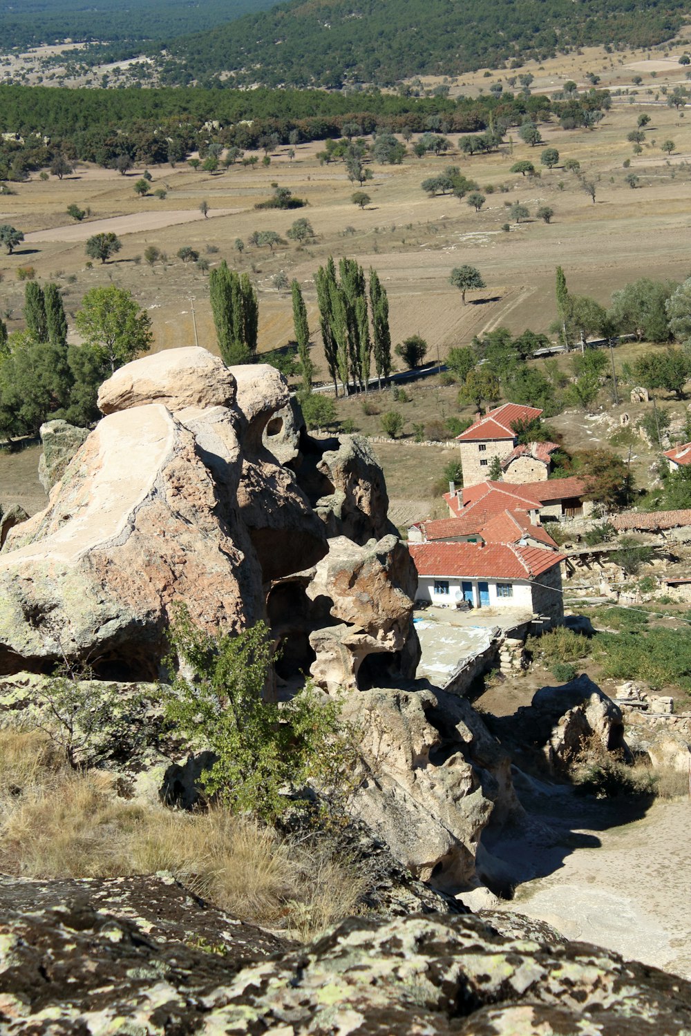 a house on a rocky hill