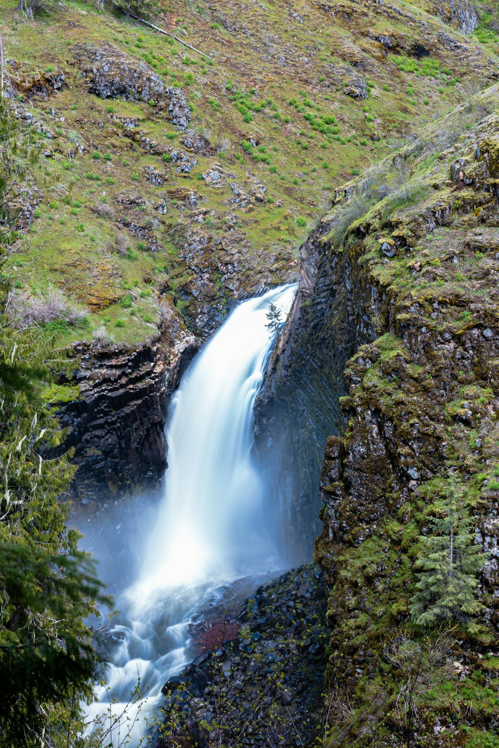 a waterfall in a rocky area