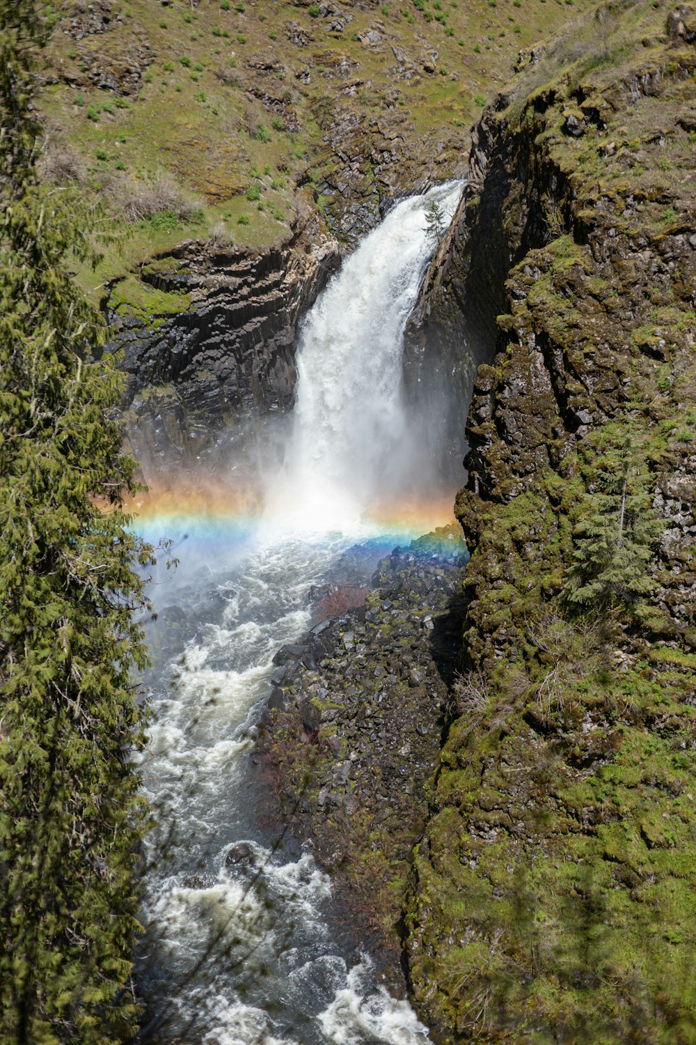 a waterfall in a rocky area