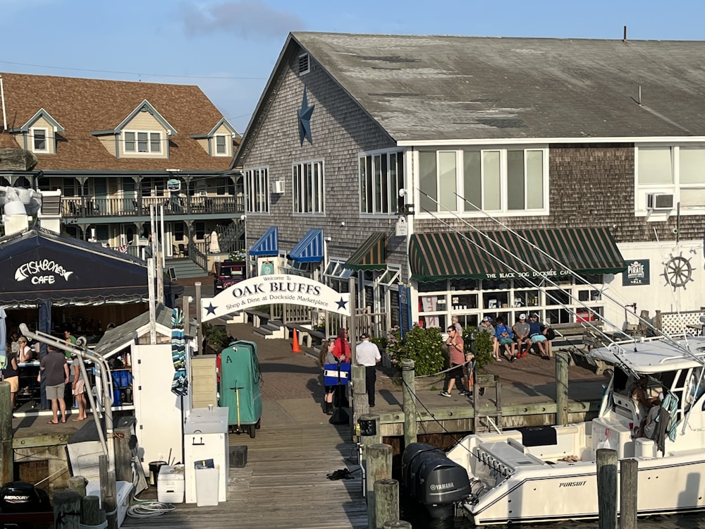 a group of people walking around a town