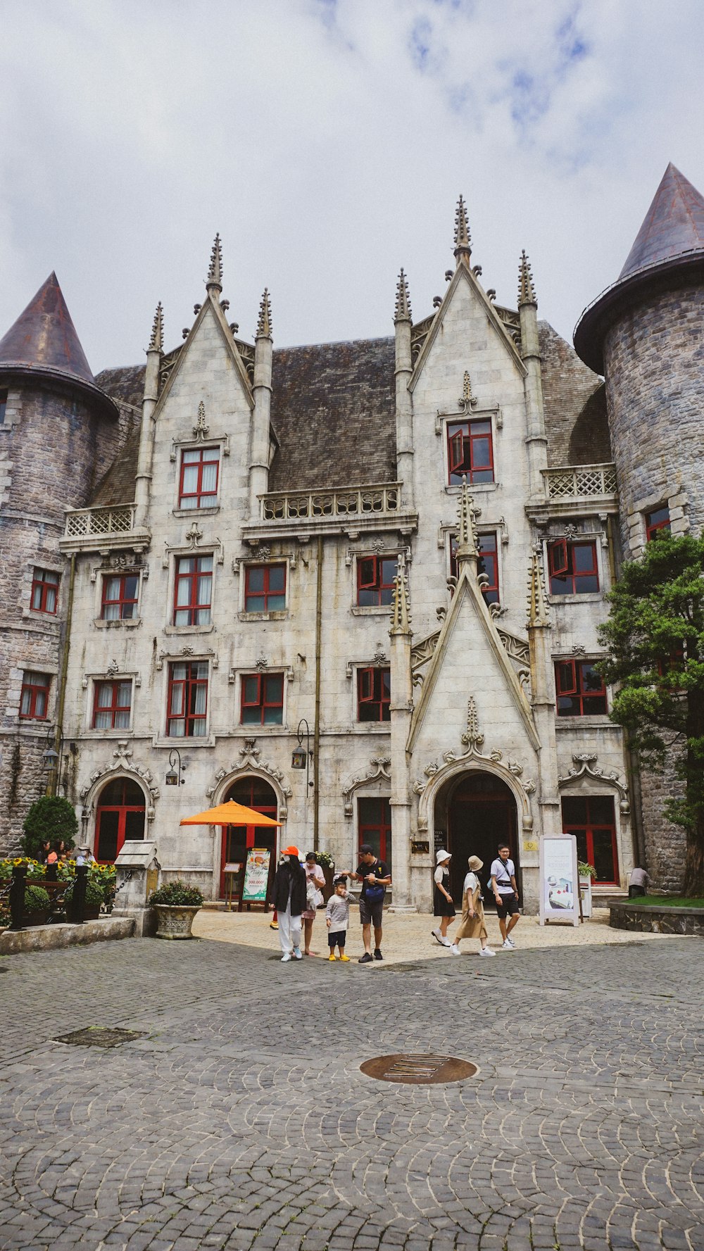 a group of people standing outside a building