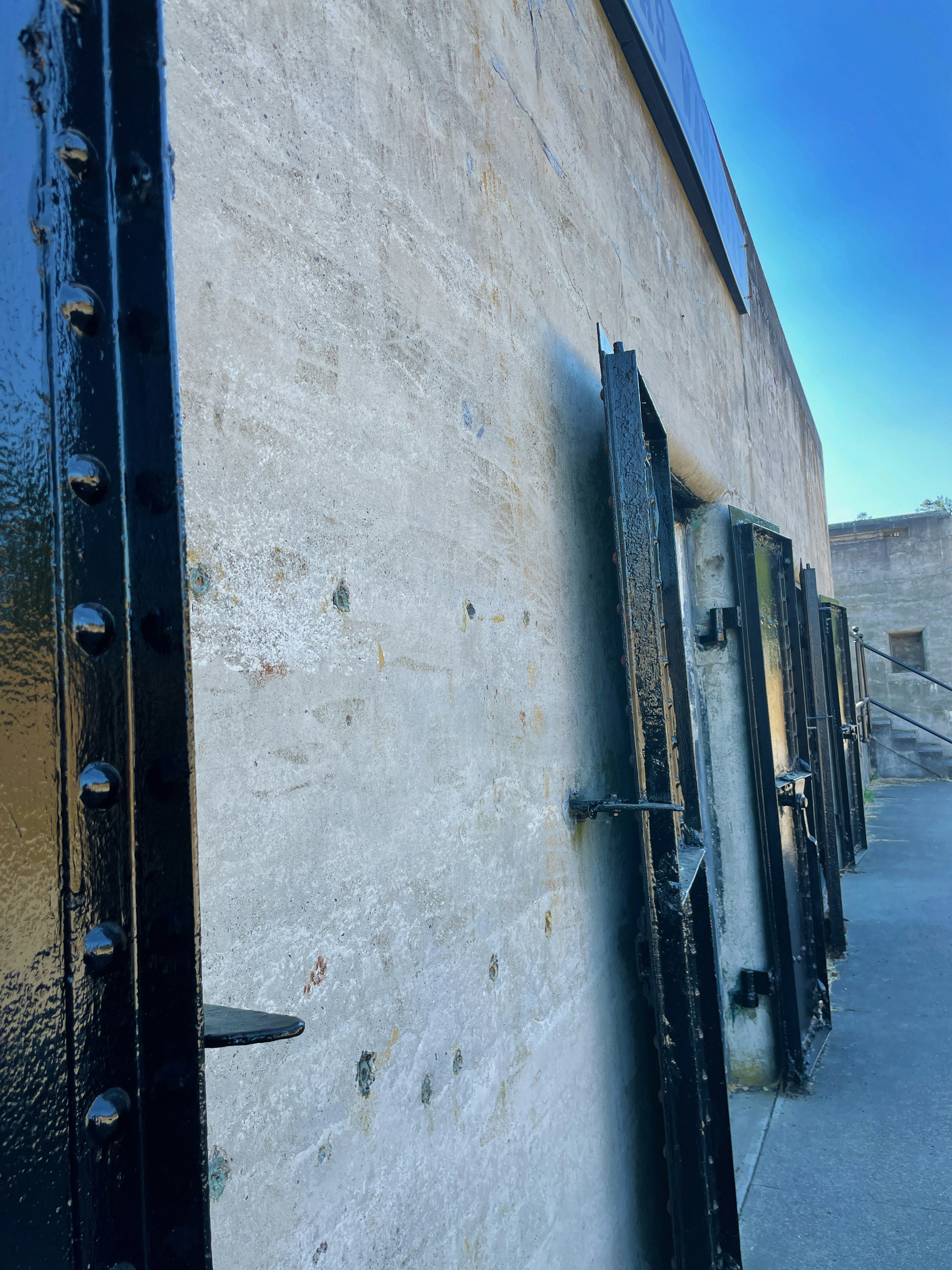 a train car is parked on the side of a building