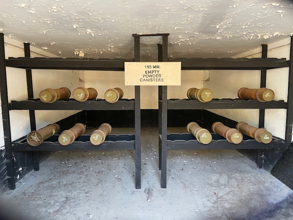 a large display of old military guns