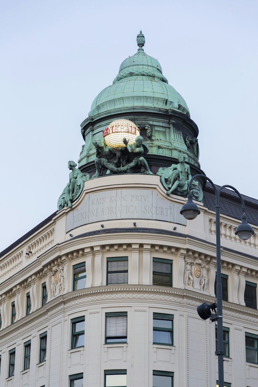 a building with a statue on top