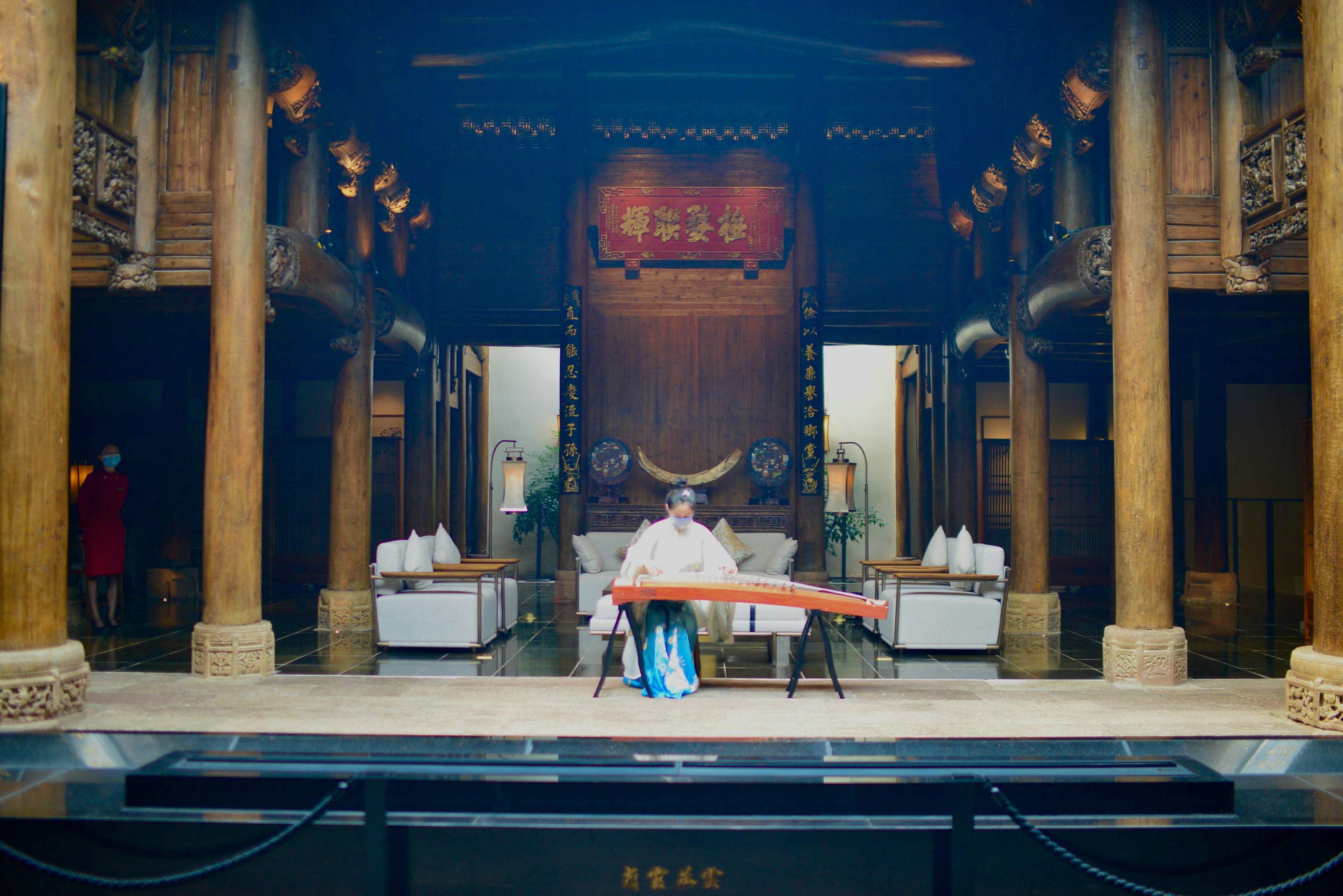 a person sitting on a stage