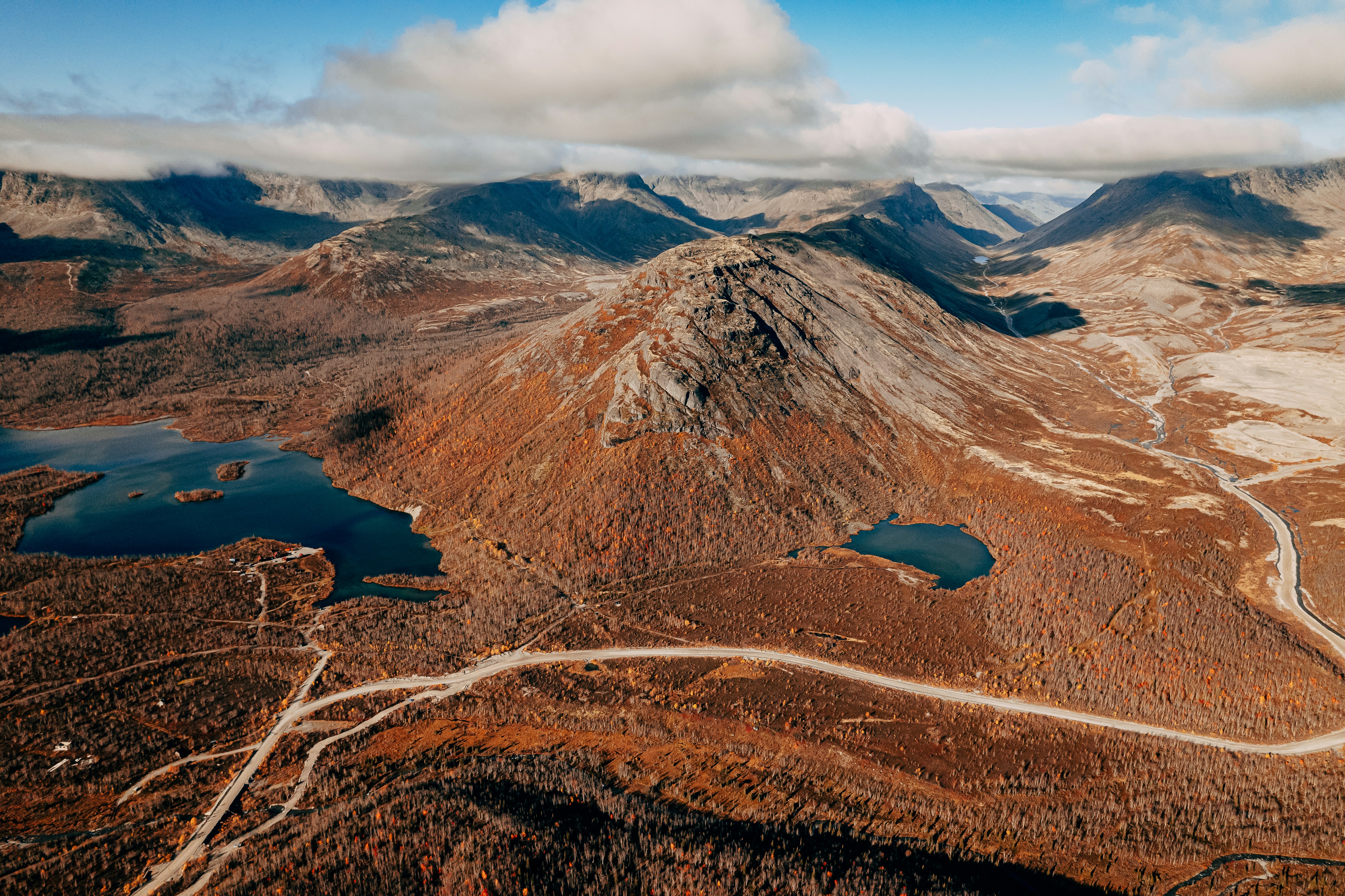 a beach with a mountain in the background