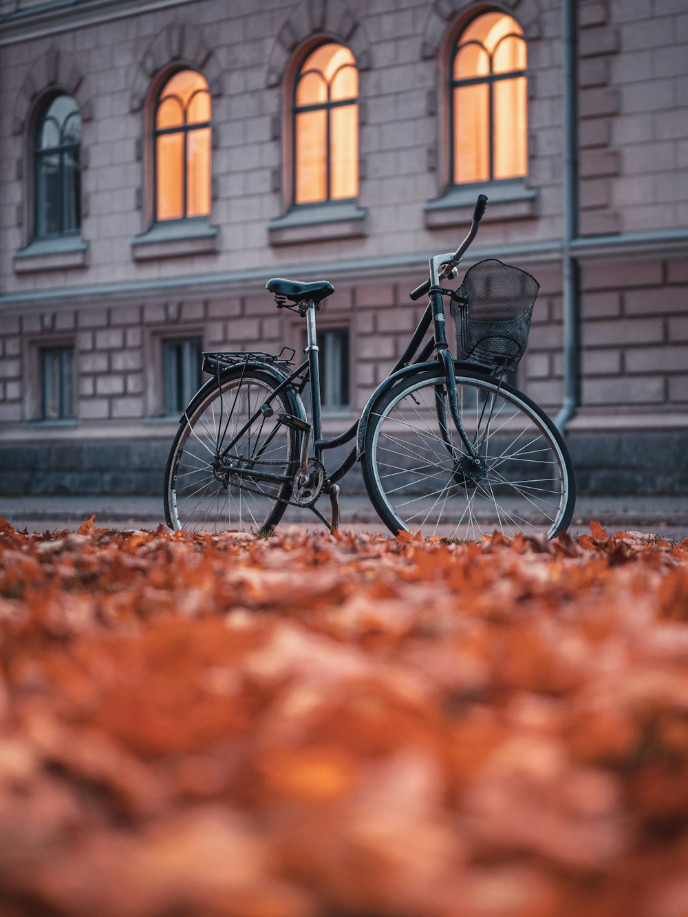 a bicycle parked in front of a building