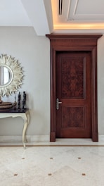 a wood door in a room