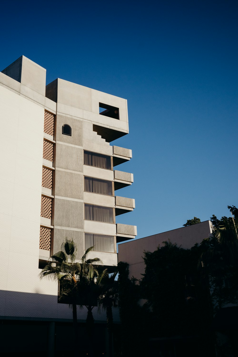 a tall building with a blue sky