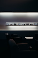 a room with a table and chairs