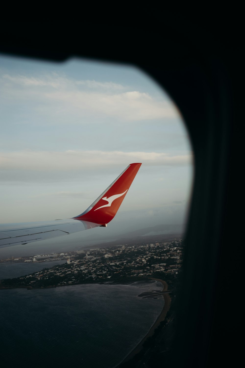 an airplane wing in the sky