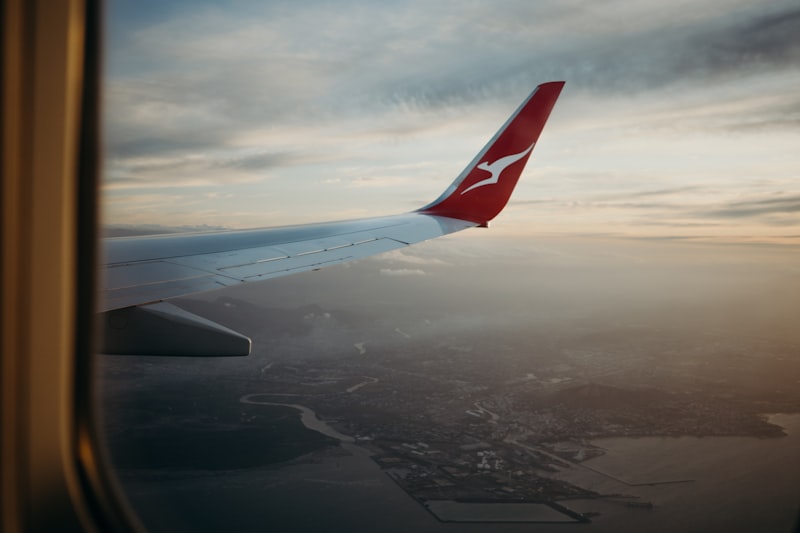 Airplane wing above the clouds