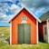 A small red wooden building with a gabled roof features a black double door and a circular window above it. The sign above the door reads 'Lillväg Skillinge'. Surrounded by grassy fields under a partly cloudy blue sky.