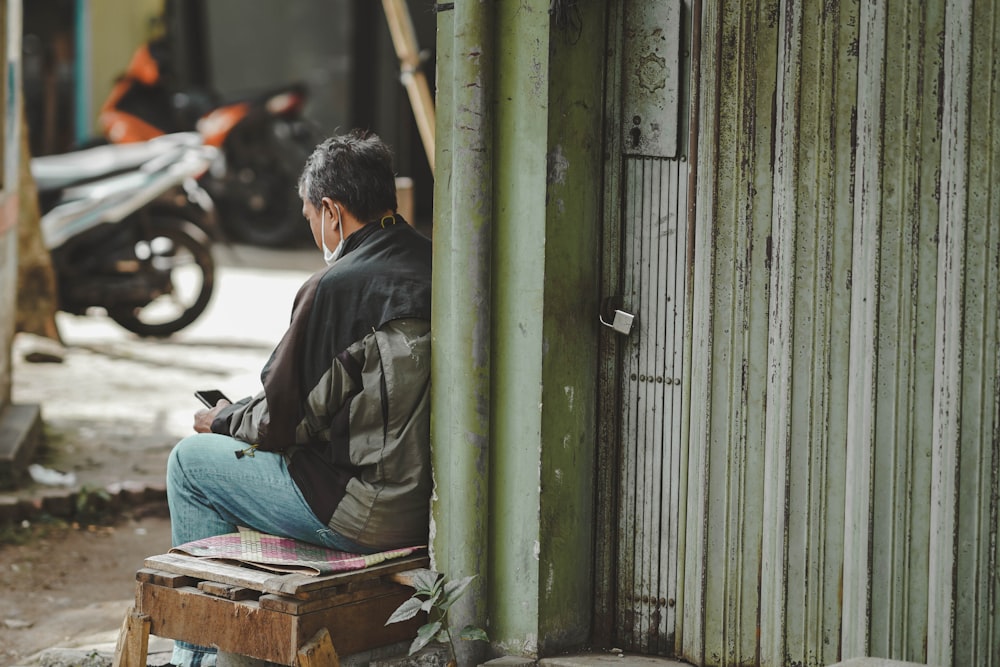 a man sitting on a bench