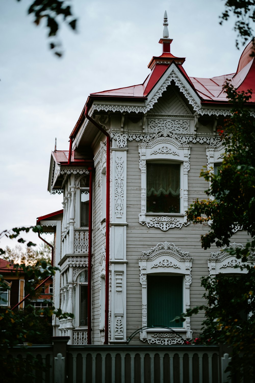 a white house with a red roof