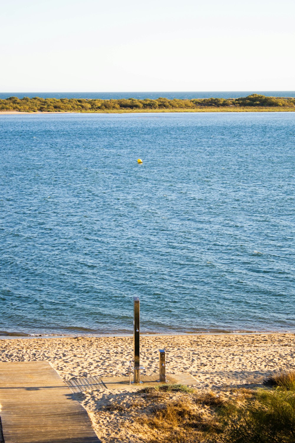 a beach with a body of water