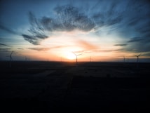 Wind turbines at sunset