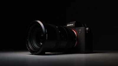 High-definition photo shoot scene with Lumix camera and minimalistic dark background.