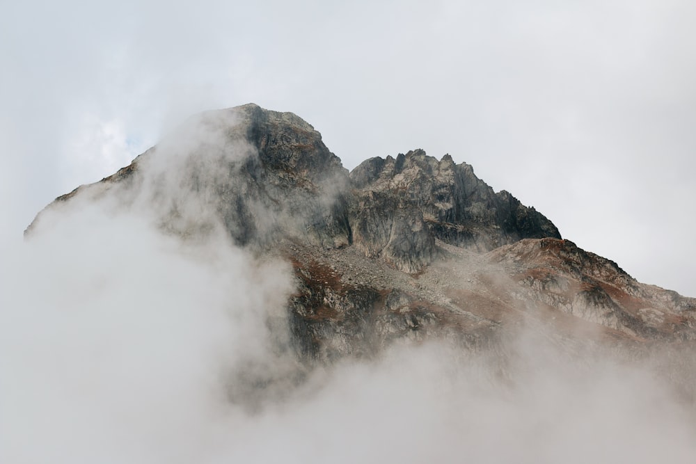 a mountain covered in clouds