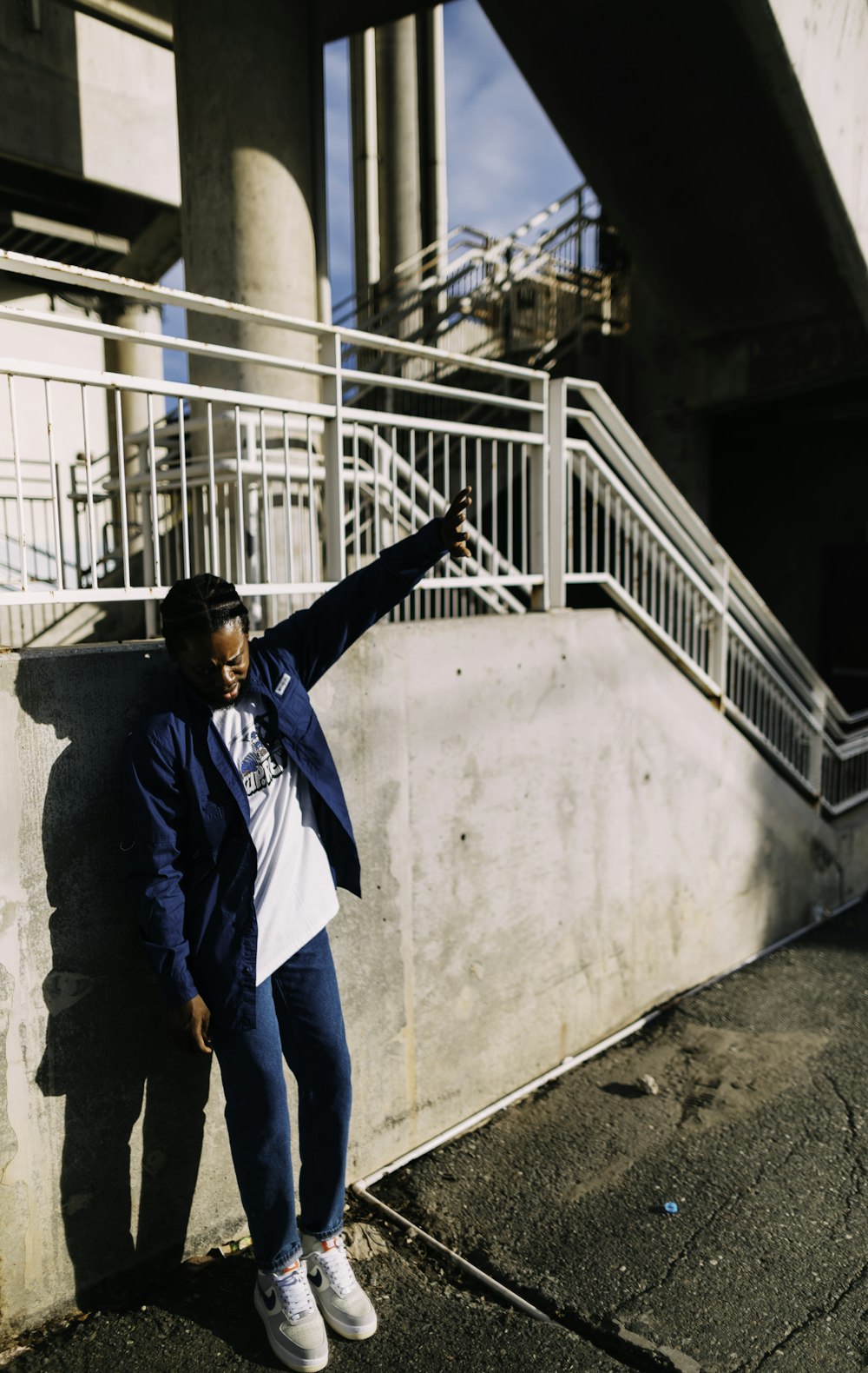 a person standing on a bridge