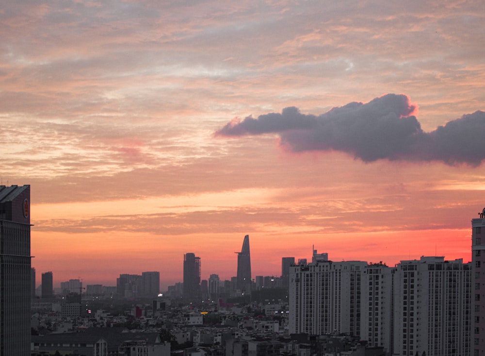 a city skyline at sunset