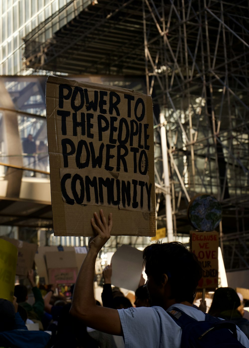 a group of people holding signs