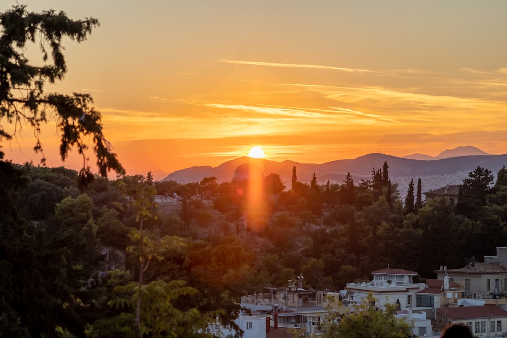 a sunset over a city