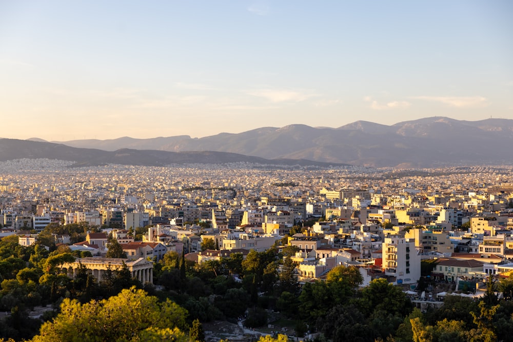 a city with mountains in the background