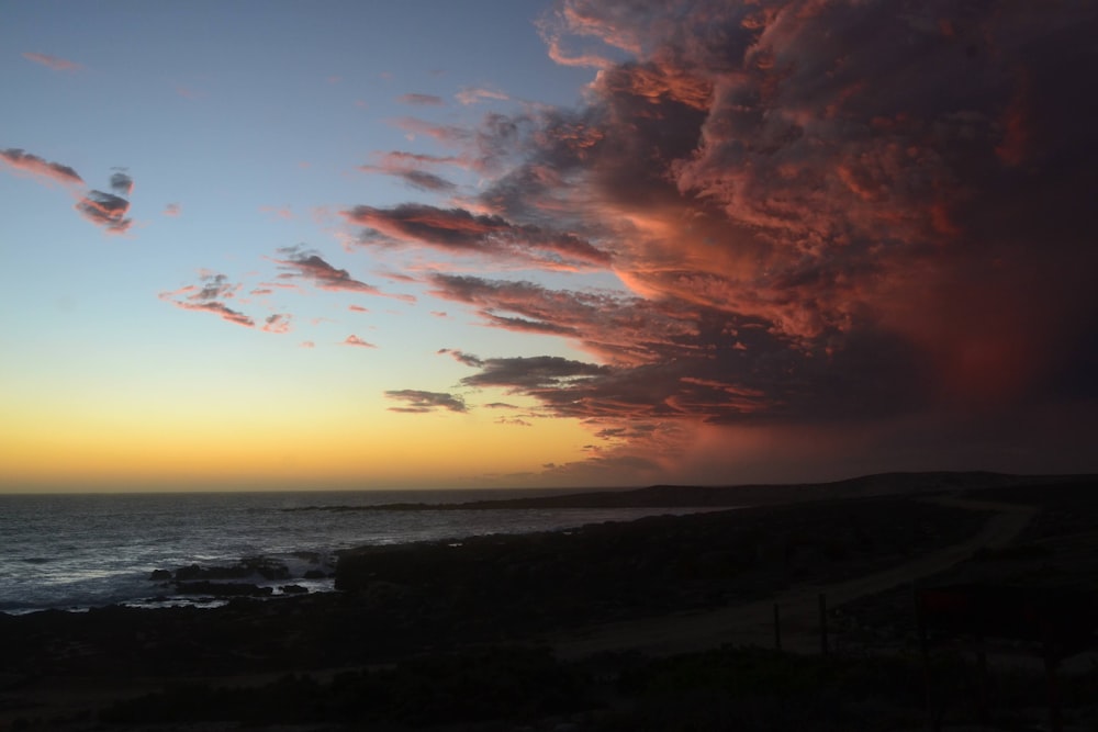 a sunset over a beach