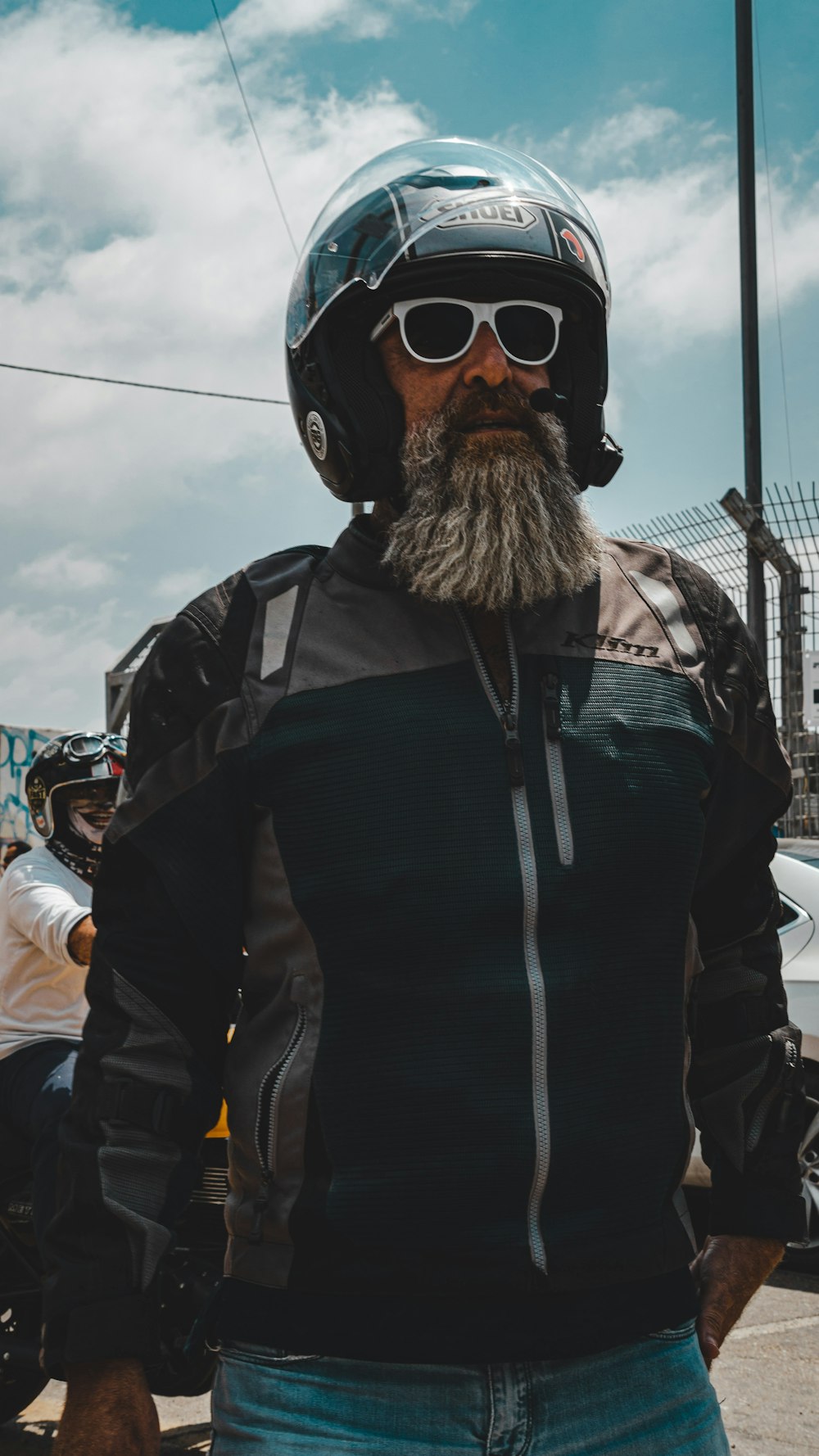 a person wearing a helmet and sunglasses