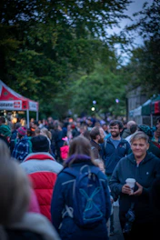 a crowd of people walking
