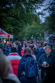 a crowd of people walking