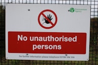 A warning sign indicating potential hazards of non-compliance.
