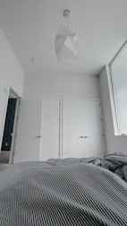 A serene bedroom showcasing calming colors and minimalist design elements.